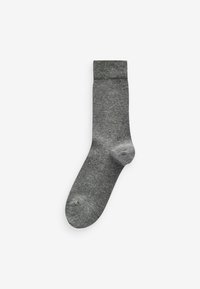 Gray, knee-high sock with a smooth texture, ribbed cuff, and rounded toe. Material appears soft and durable, with slight color variation.