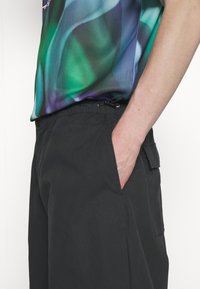 YOURTURN UNISEX - Pantalon classique -  black
