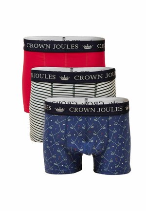 Three pairs of men's boxer briefs: red, green and white striped, and navy with golf patterns. Each features a black "CROWN JOULES" waistband.