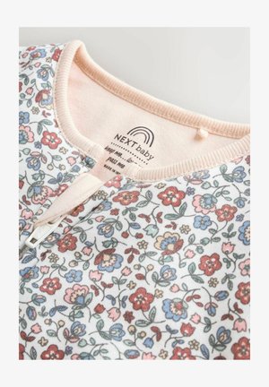 Îmbrăcăminte pentru bebeluși cu model floral din bumbac moale, cu finisaje roz, guler rotund și închidere cu fermoar frontal pentru îmbrăcare ușoară.