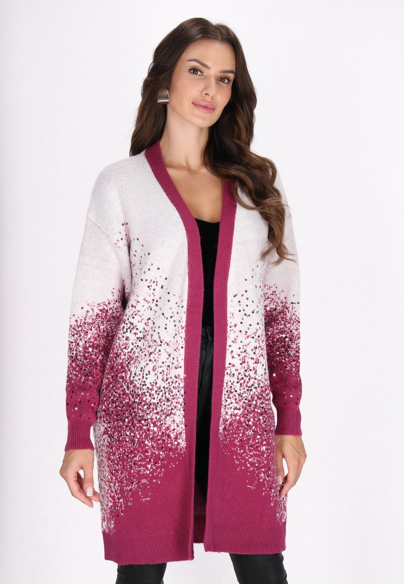 Cardigan lungo in gradiente bianco e magenta, caratterizzato da un design scintillante con paillettes, apertura sul davanti e bordi a coste sulle maniche e l'orlo.