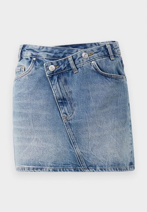 Denim mini skirt in light blue, featuring angled seams, two front pockets, and two metallic buttons at the waistband. Worn, textured finish.