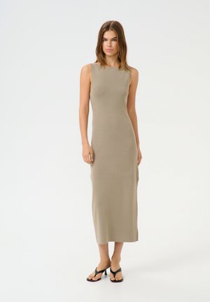 Sleeveless beige knitted dress with a fitted silhouette, reaching mid-calf, featuring a round neck and subtle ribbed texture.