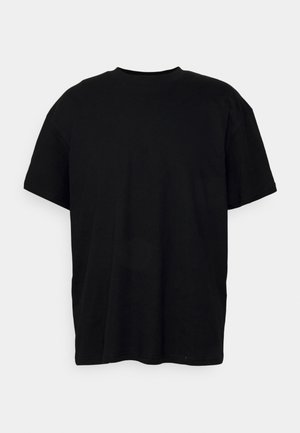 Black cotton t-shirt with a round neckline and short sleeves. Features a loose, relaxed fit and a smooth, unembellished texture.