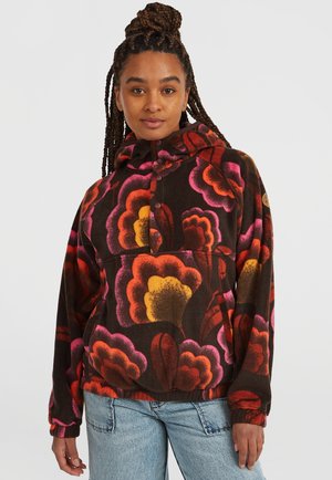 Bruine fleece pullover met een bloemenpatroon in roze, rood en geel. Voorzien van een capuchon en een knoopsluiting, met elastische manchetten aan de mouwen.