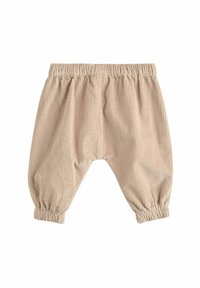 Beige kordbársony nadrág, rugalmas derékrésszel és szűkített szárakkal, finom függőleges csíkmintával és laza siluettel.