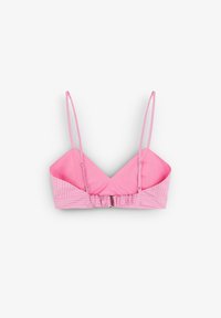 Růžový bralet s tenkými ramínky, vyrobený z hladkého materiálu a s pruhovaným vzorem ve spodní části, zapínaný na přední klips.