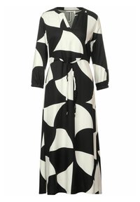 Długa czarno-biała sukienka w abstrakcyjny wzór z długimi rękawami, dekoltem w kształcie litery V oraz paskiem do związania w talii.