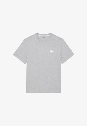 Hellgraues T-Shirt mit kurzen Ärmeln und Rundhalsausschnitt mit kleinem weißem Krokodil-Logo auf der linken Brustseite.