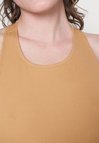 Calvin Klein NOVE CUT-OUT MAXI DRESS - Φόρεμα-πουλόβερ - pale terracotta