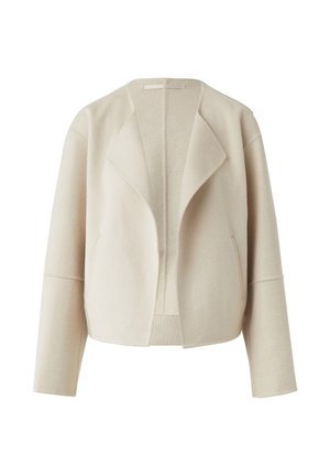 Beige, cropped wool jacket with a shawl collar, side pockets, and ribbed hem. Smooth texture and wide sleeves create a relaxed fit.