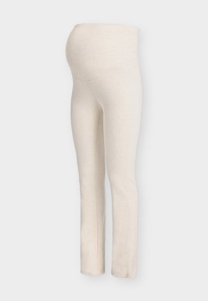 Krém színű kismama leggings puha, rugalmas kötött anyagból, széles derékrésszel a kényelemért és testhez simuló láb kialakítással.