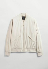 Lichtbeige bomberjack gemaakt van glad stof, met een voorkant rits, zijzakken en ribgebreide manchetten en zoom.