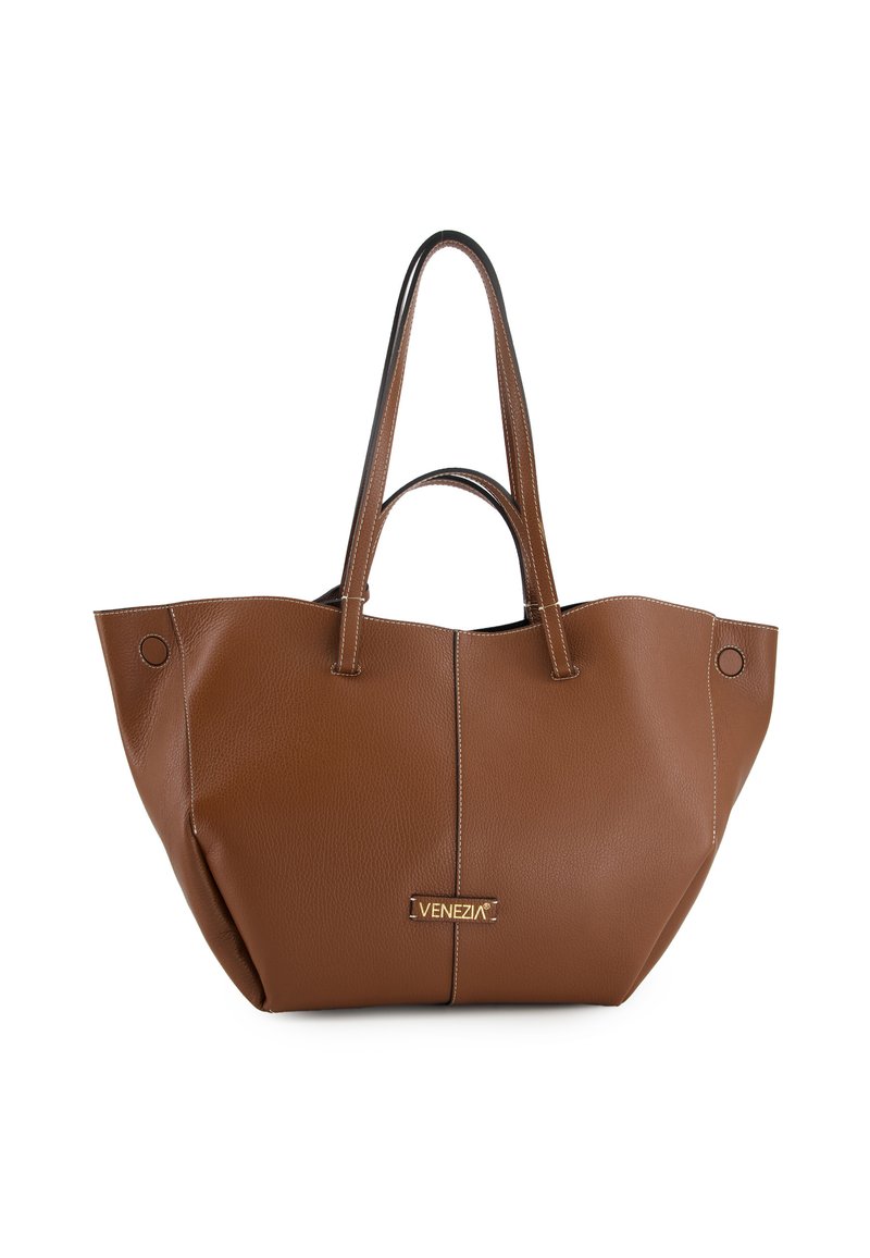 Brown leather tote bag with double handles, white stitching, and "Venezia" gold nameplate centered on front.
