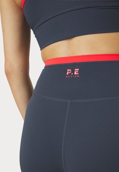 P.E Nation VITA LEGGING - Tights - marine blue/poppy red