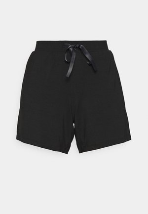 Black shorts made of soft fabric with an elastic waistband and a black satin ribbon tie. Features a relaxed fit and smooth texture.