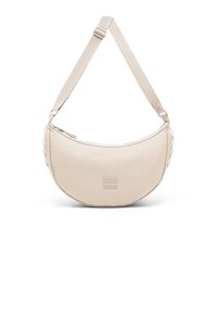 Béžová ramenná taška v tvare polmesiaca s nastaviteľným popruhom a malou prednou nášivkou loga na bielom pozadí.