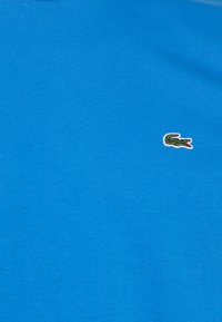 Lacoste Basic póló - hilo