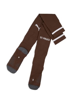 Calzini sportivi marroni con punte e talloni grigi, logo Puma bianco, strisce bianche vicino alla parte superiore e testo "ST. PAULI" su un lato.