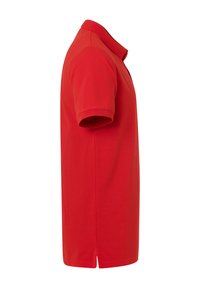 Rode polo shirt van katoen, met een kraag, korte mouwen en een rechte snit met zijsplitten voor gemakkelijk bewegen.