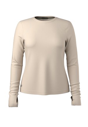 Maglia a maniche lunghe color beige chiaro realizzata in materiale elasticizzato. Presenta cuciture piatte, un colletto arrotondato e aperture per il pollice nei polsini.