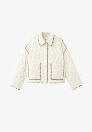 Veste matelassée blanche avec coutures courbes, deux poches avant, un col pointu et une bordure beige le long des bords et des coutures.