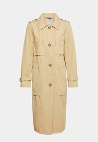 Trench-coat beige longueur genou avec de grands boutons, deux poches avant, détails de ceinture sur les manches et col avec épaulettes.