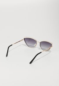 ALDO CALANDERIEL - Sunglasses - black/gold multi