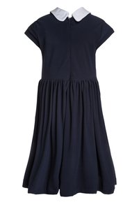 Laivastonsininen mekko, jossa on valkoinen kaulus, lyhyet hihat ja takana vetoketjusuljin. Mekossa on laskostettu hameosa antamassa tilavuutta ja liikkuvuutta.