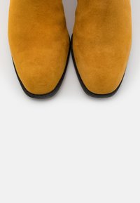 Tamaris Stiefel - saffron