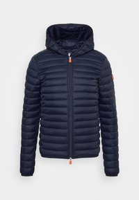 Navy puffer jacket with a zip closure and a hood. Features quilted pattern and orange zipper pull. Made from lightweight material.