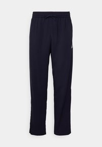 Navy elastic waistband pants with adjustable drawstring, tapered leg, and side pockets. Made of soft, lightweight fabric with minimal branding.