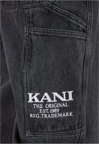 Karl Kani OG GY WOREAR LOGO PRINT DENIM - Traperice ravnih nogavica - bleached black