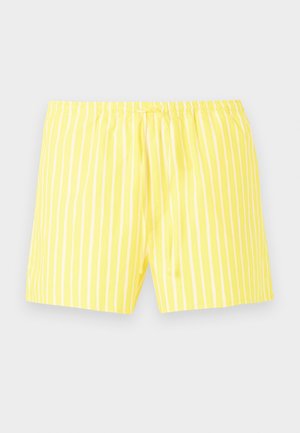 Shorts jaunes à rayures blanches verticales avec une taille élastique et un cordon de serrage à l'avant, présentés sur un fond uni.