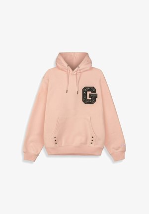 Pink hoodie with a large black "G" logo and studs on the pocket, featuring a front kangaroo pocket and drawstring hood.