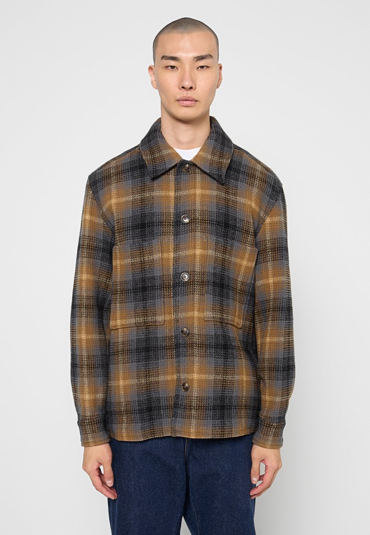 closed Lichte jas bruin