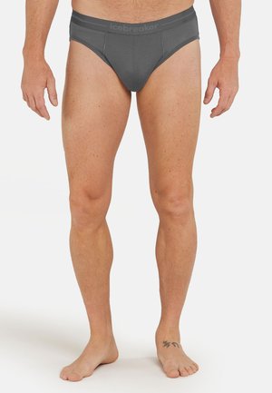 Graue Baumwollbriefs mit einem dehnbaren Bündchen, das mit dem "icebreaker"-Markenlogo versehen ist. Das Design ist enganliegend mit einer glatten Textur und minimalen Nähten.