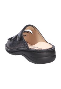 Black leather slide-on sandal with cut-out detailing, cushioned insole, and thick rubber sole for comfort. Features a rounded toe design.