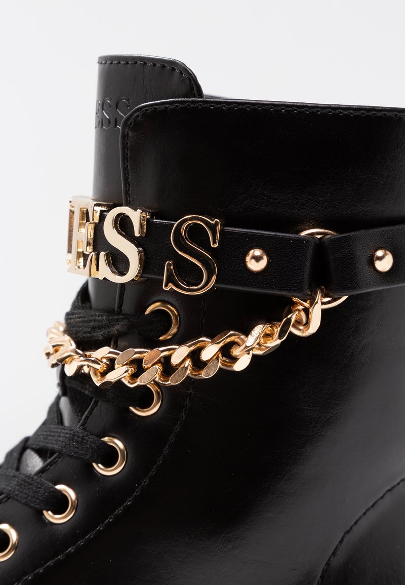 Black and gold guess boots Clearance