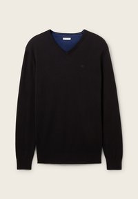 Pull noir à col en V en tissu fin tricoté, avec manches longues et un logo discret sur la poitrine. L'intérieur présente une bordure bleue contrastante.