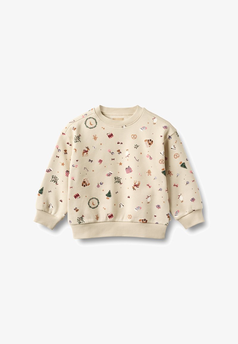 Sweat-shirt pour enfants de couleur crème avec des motifs à thème festif comprenant des rennes, des maisons en pain d'épice, des couronnes, des cannes de bonbon et des pins.