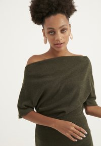 Herita - Sukienka etui