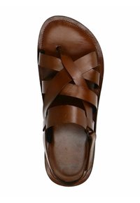 Brown leather sandal featuring crisscross straps, open toe, and a textured footbed. Smooth finish with a round sole contour.