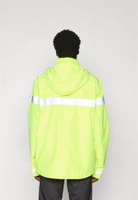Vaude MENS LUMINUM RAIN JACKET - Sykkeljakke - neon yellow