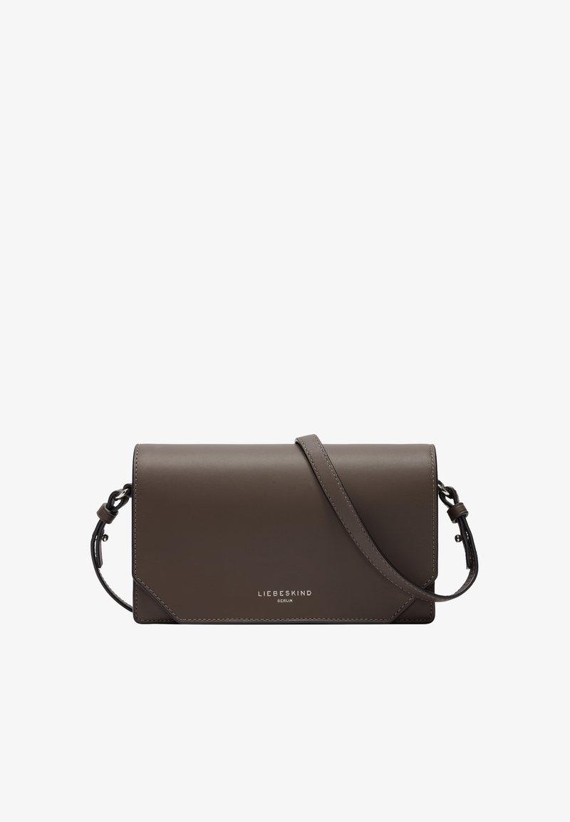 Brown leather crossbody bag with a rectangular shape. Features a decorative accent, adjustable strap, and visible brand logo on the front.