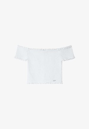 Hvid off-shoulder-top lavet af tekstureret stof med flæser og korte ærmer. Har et lille logo-tag forneden.