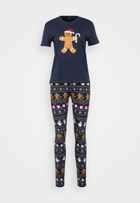 Set de pijama de algodón en color navy que incluye una camiseta de manga corta con un diseño de hombre de jengibre y leggings estampados con motivos navideños.