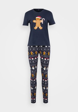 Set de pijama de algodón en color navy que incluye una camiseta de manga corta con un diseño de hombre de jengibre y leggings estampados con motivos navideños.