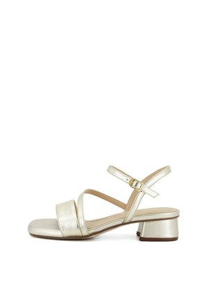 Sandalo da donna in metallo oro con tacco basso a blocco, due cinturini frontali e cinturino regolabile alla caviglia con chiusura a fibbia.