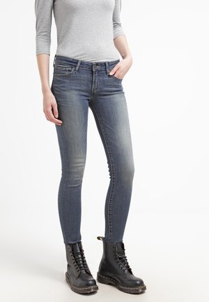 Vaqueros pitillo - stone blue denim